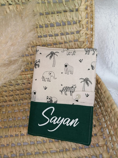 Protège carnet de santé personnalisé finition passepoil - L'atelier de Chloé